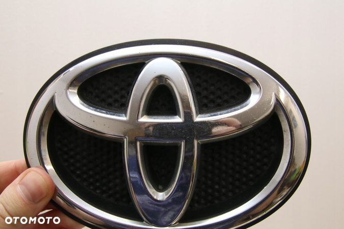Logo Emblemat znaczek przod grill Oryginał Toyota Avensis T27 08- T29 Lift - 2