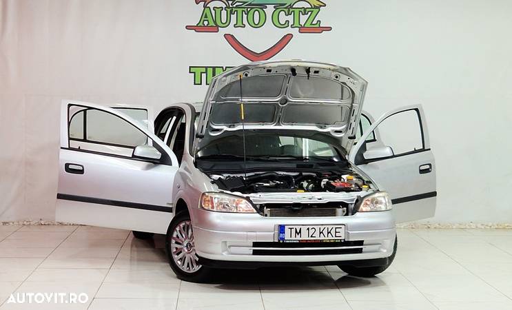 Opel Astra 1.4i 16V Club - 13