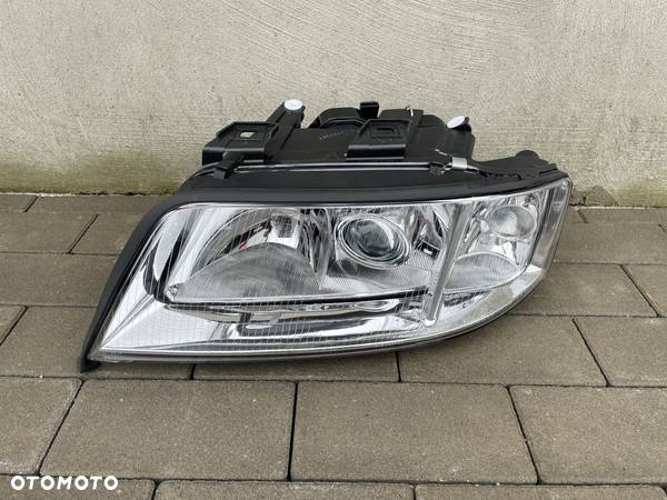 LAMPA PRZEDNIA LEWA AUDI A6 C5 LIFT  1999-2001 - NOWA - 1