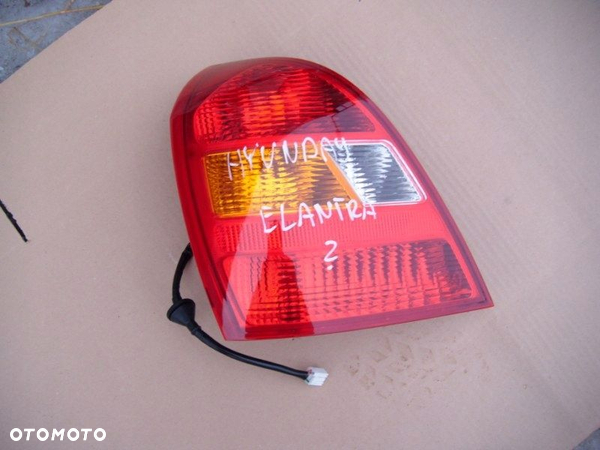 Hyundai Elantra lampa tył oryg WKŁAD LAMPY NOWY - 1