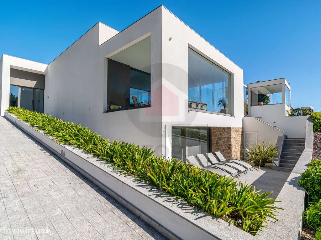 Propriedade contemporânea que combina privacidade, arquitetura e na...-5