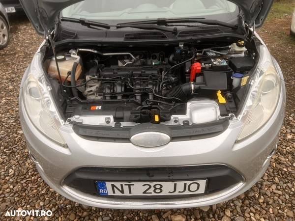 Ford Fiesta 1.25i Titanium - 13