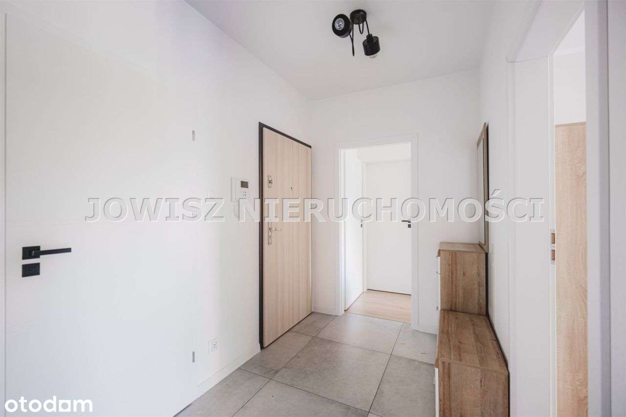 53,53 m2 ul 4 Pory Roku,z miejscem postojowym-9