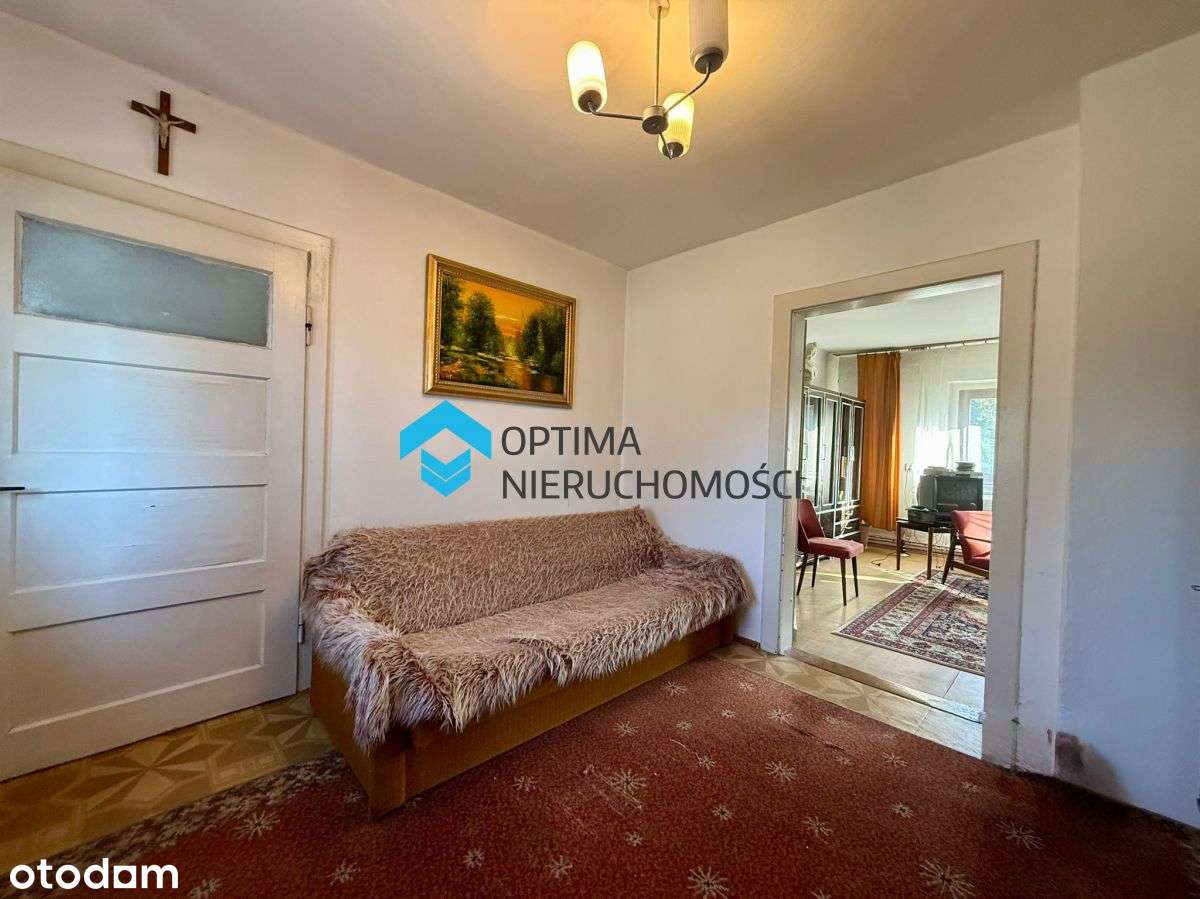 Dom z potencjałem w spokojnej dzielnicy-14