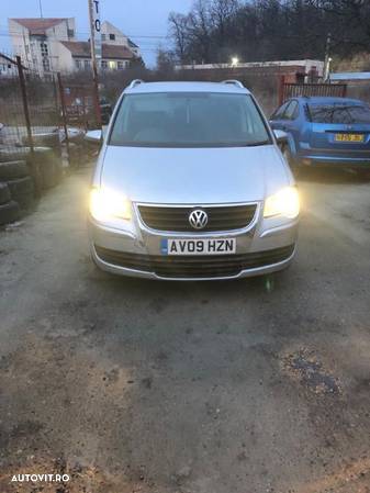 Dezmembram Vw Touran 1.9 Bxe 2009 - 2