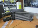 Radiador Intercooler K7798007 PEUGEOT 207 2008 1.6I USADO - 1