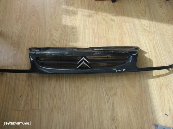 Grelha Frontal Simbolo Citroen Saxo - 1