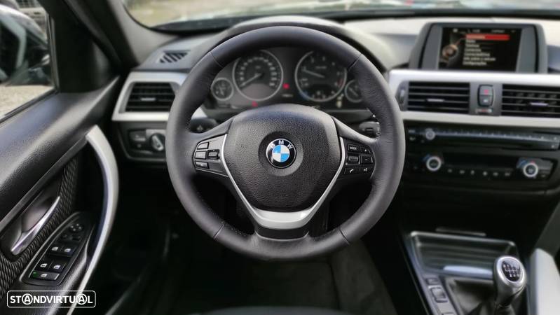 BMW 320 d Touring - 14