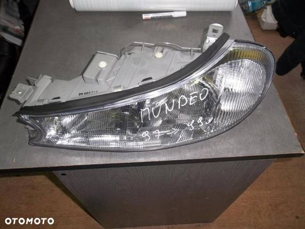 Ford Mondeo MK2 97-99r lampa reflektor L - 1
