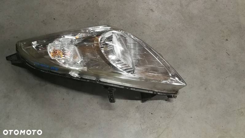 Lampa lewa przód przednia Suzuki Swift MK7 10-16 - 2