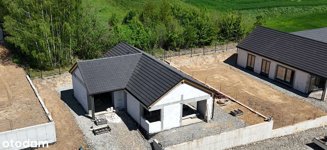 Nowoczesny dom z garażem w spokojnej okolicy