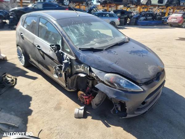 Dezmembrez Ford Fiesta 6 an 2011, motor 1.4 tdci 70cp cod KVJA, cutie de viteze manuala 5+1 trepte aripa stanga fata, usa dreapta spate, usa stanga spate, aripa stanga spate, aripa dreapta spate, far stanga, capota, broasca usa, praguri, spira volan, interior complet, armatura, carenaj aparatori noroi, torpedou, timonerie schimbator, proiectoare, parasolare, centuri siguranta spate, maneta stergatoare, grila aerisire, ceasuri de bord, haion cu luneta, bara spate, stop tripla dreapta, stop tripla stanga, carlig, usita rezervor, plafoniera, incuietoare capota, amortizor haion, oglinda retrovizoare, chedere, consola centrala, set fete usi, emblema fata, maneta stergatoare, brate stergatoare, plansa bord, scrumiera, butoane geamuri electrice, mocheta portbagaj, - 3