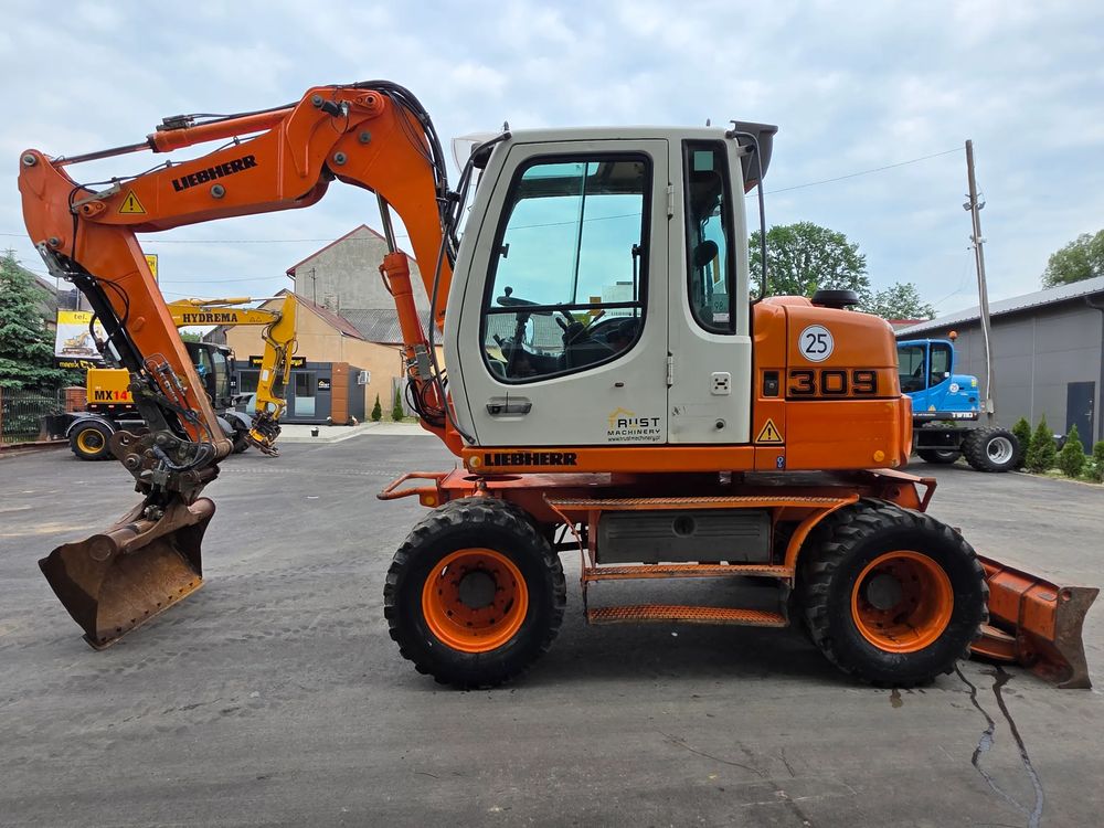 Liebherr A309 litronic 2011