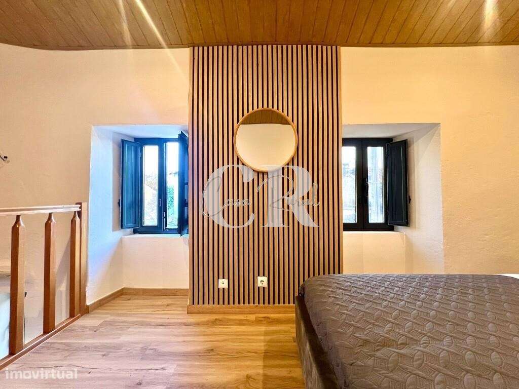 Moradia acolhedora no centro histórico com potencial de investimento-18