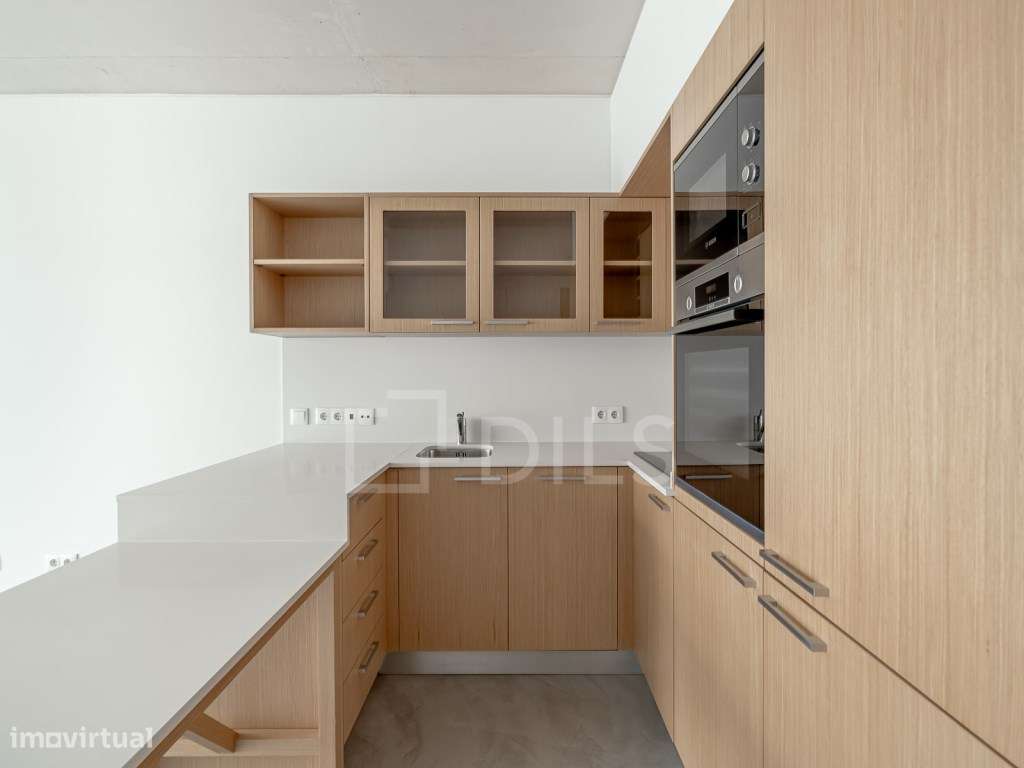 Apartamento T2 com estacionamento e arrecadação em Alcântara - Grande imagem: 3/19