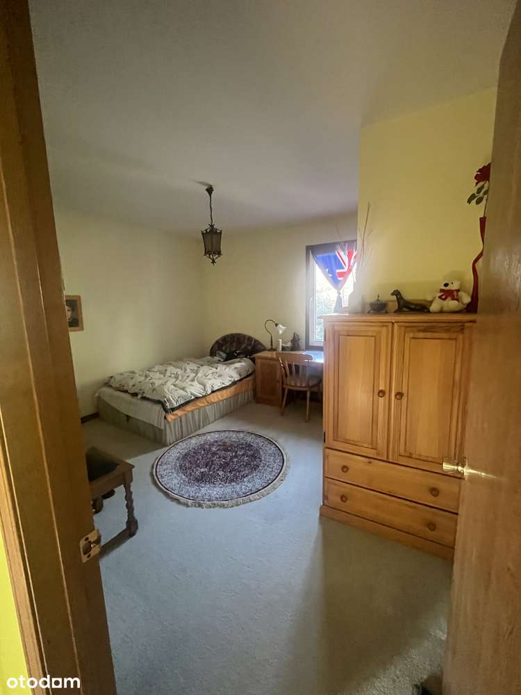 Dom z dużym ogrodem na osiedlu Zielonym-13