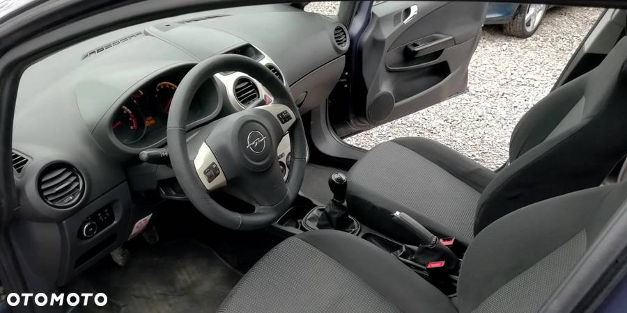 Opel Corsa 1.2 16V Enjoy - 12