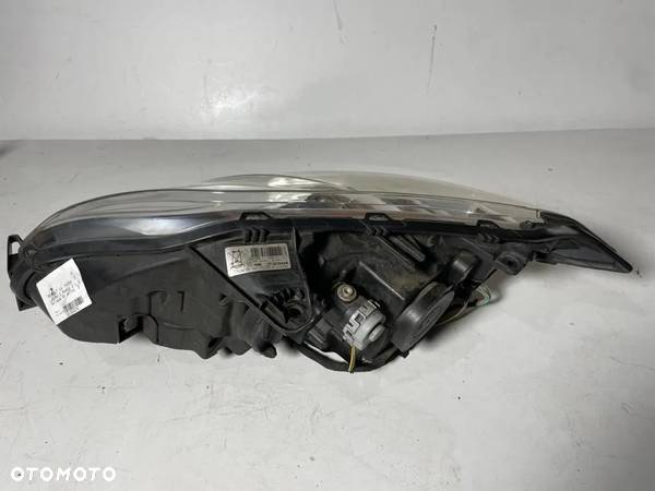 LAMPA PRAWA PRAWY PRZÓD PRZEDNIA XENON LAGUNA III 260100035R 2008- - 4