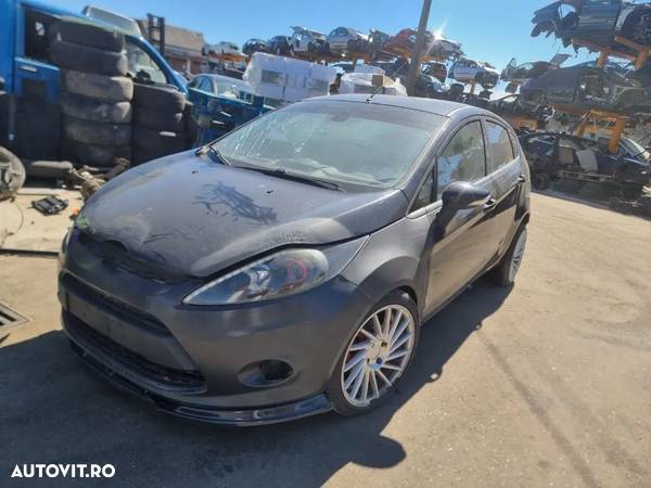 Dezmembrez Ford Fiesta 6 an 2011, motor 1.4 tdci 70cp cod KVJA, cutie de viteze manuala 5+1 trepte grila radiator, spira volan, buton reglaj oglinzi, pompa apa, injector, intercooler, bloc lumini, alternator, pompa vacuum, rampa injectoare, furtun turbo, electromotor, cadru motor, egr, rezervor, furtun intercooler, racitor gaze, radiator apa, radiator intercooler, radiator clima, debitmetru aer, vas lichid parbriz, clapeta acceleratie, electroventilator racire clima, instalatie electrica, termoflot, galerie admisie, compresor ac, vas expansiune, conducte ac, ansamblu stergatoare cu motoras, turbina, pompa injectie - 1