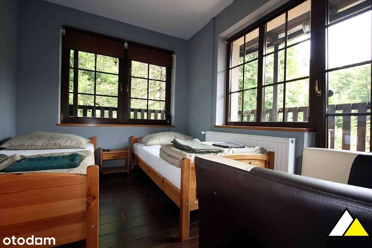 Dom z pokojami do wynajęcia i sklepem.-13