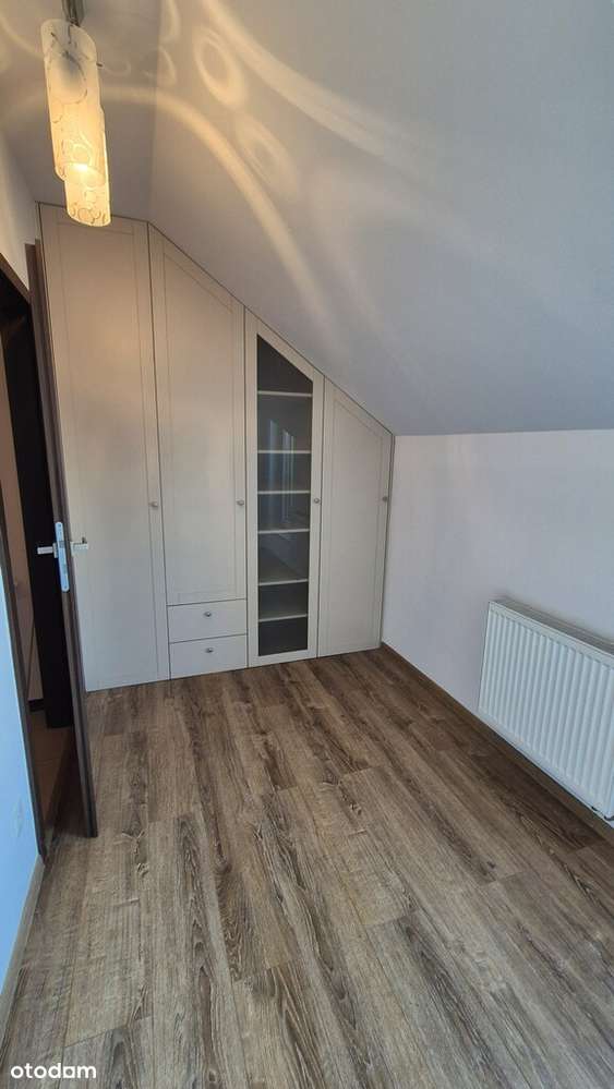 dwupoziomowe z ogródkiem i garażem na Plewiskach-9