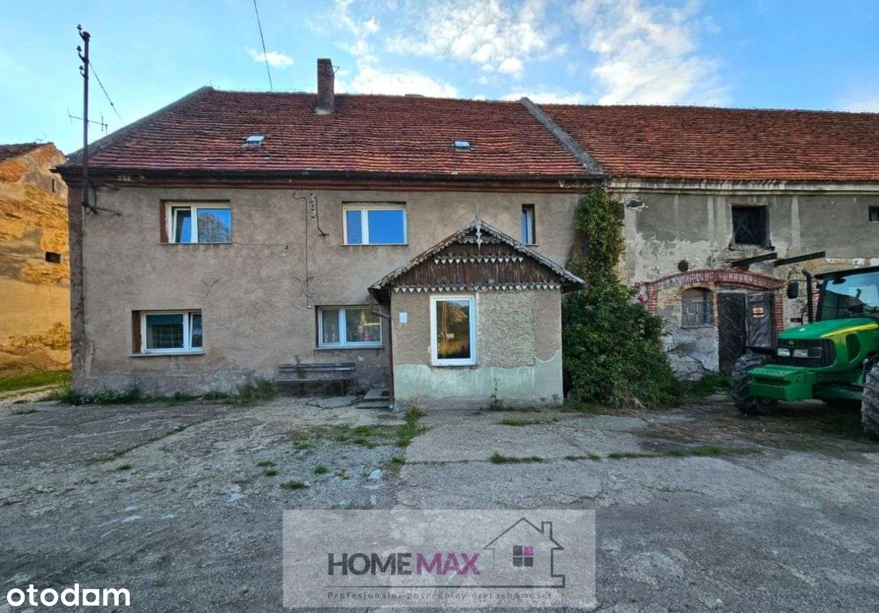 Budynek mieszkalny z zabudowaniami gospodarczymi-10