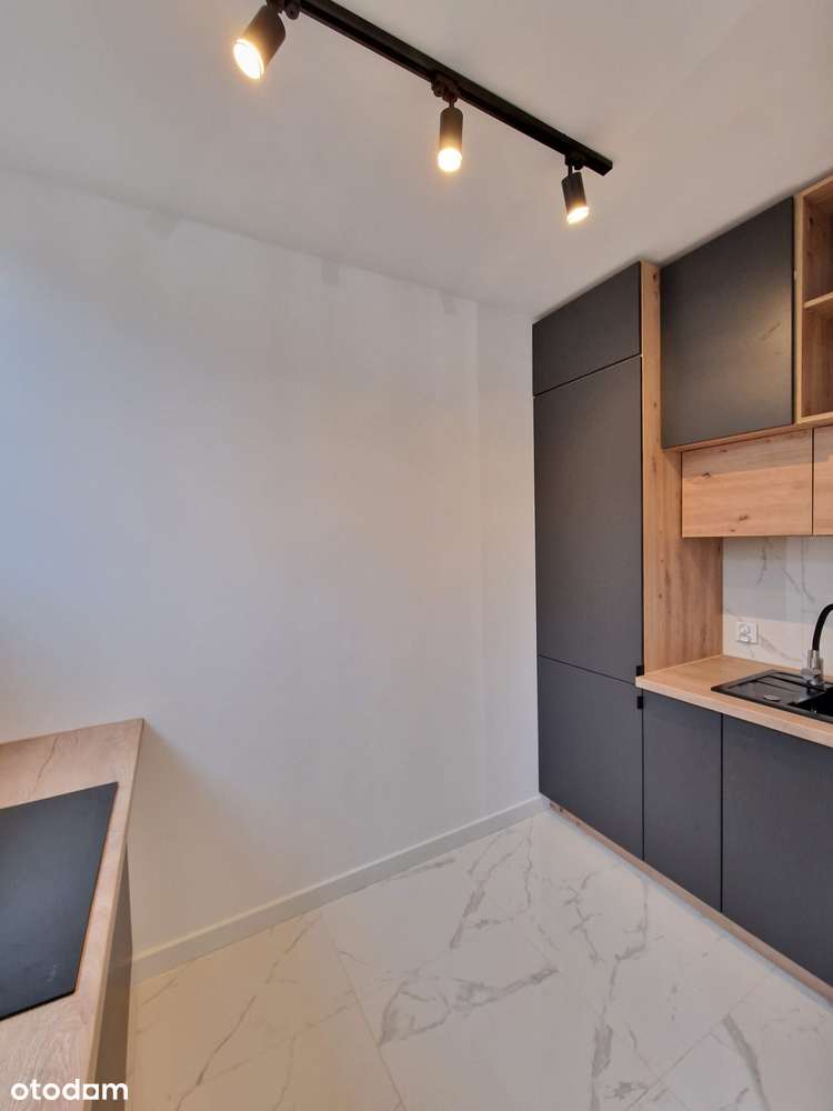 Po generalnym remoncie - 2 pokoje, winda, piwnica, 1 piętro, blisko UE - Pełny obrazek: 5/8