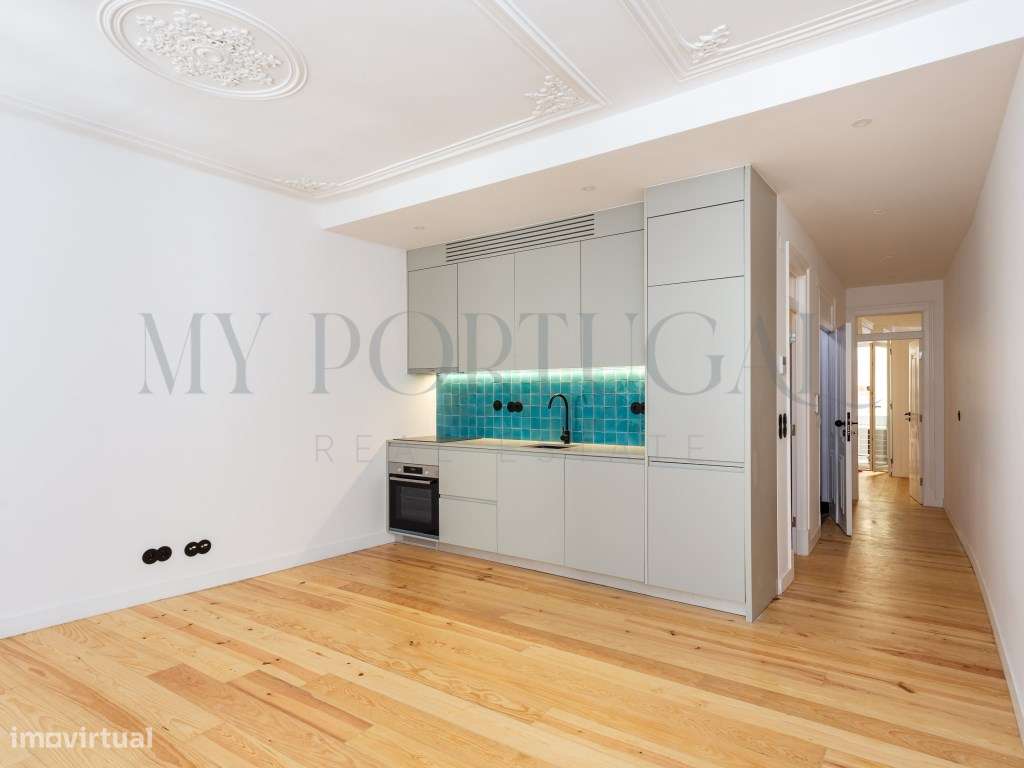 Conforto Urbano num T1 totalmente remodelado com varanda no coração...-5