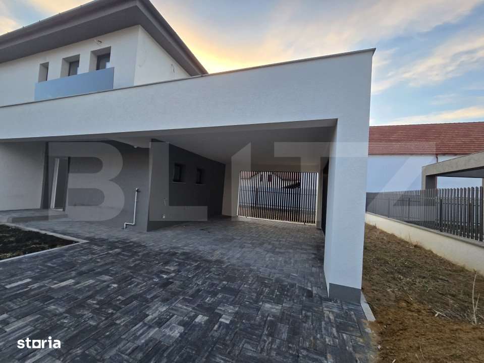 Casa individuala moderna, cu garaj, la intrare in Chinteni - Imagine principală: 3/12