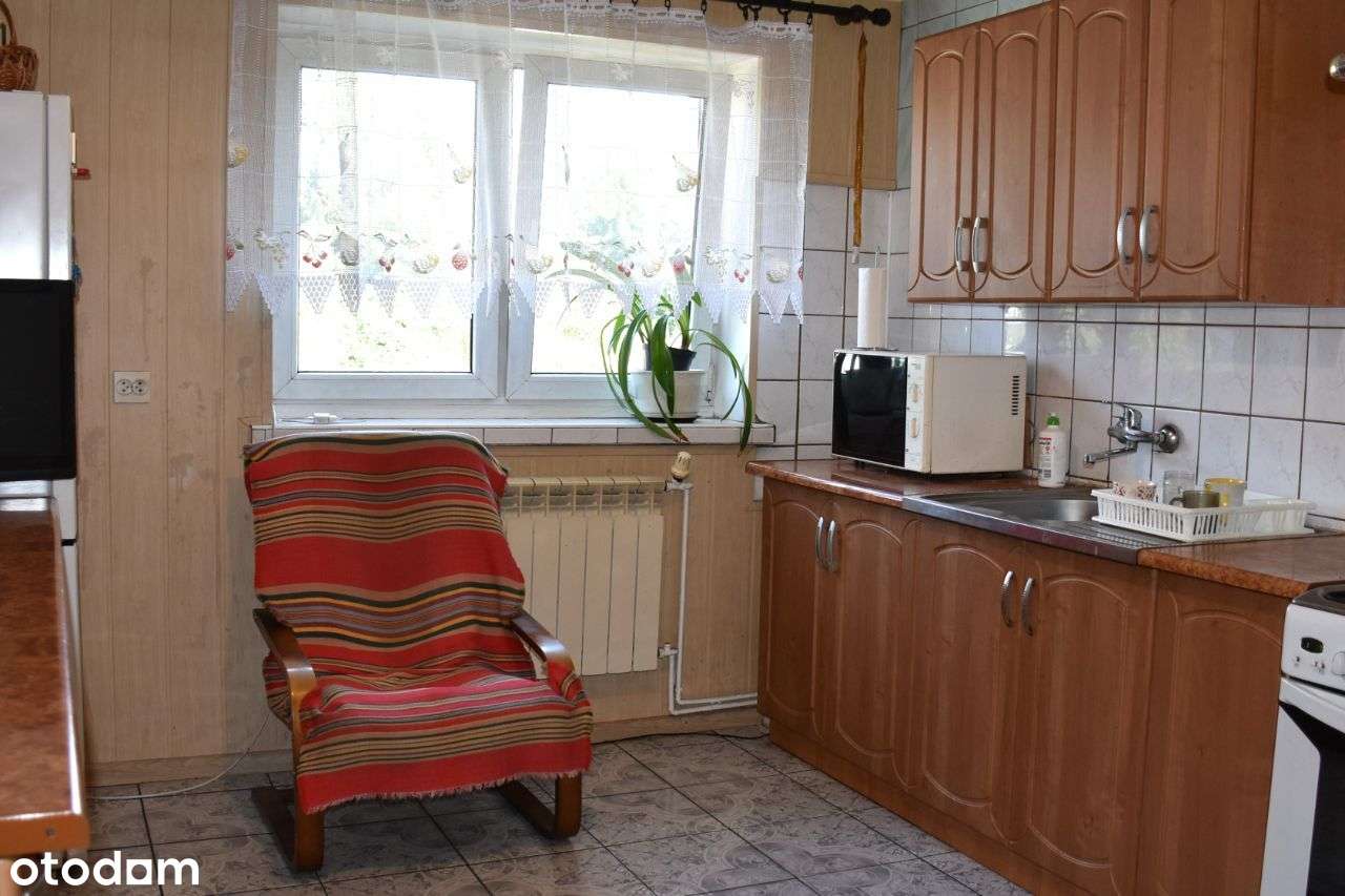 Mieszkanie 2 pokoje 1p., 2 garażami i ogródekiem-5