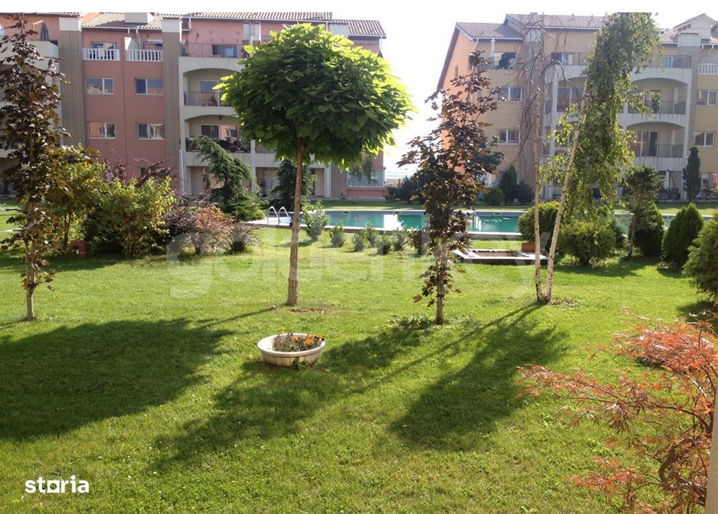 Apartament cu gradina de 100 mp si piscina comuna