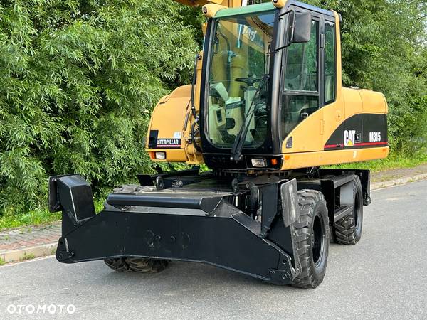 Caterpillar CAT M315C  CATERPILLAR SPROWADZONY  Bardzo Dobry Stan - 38