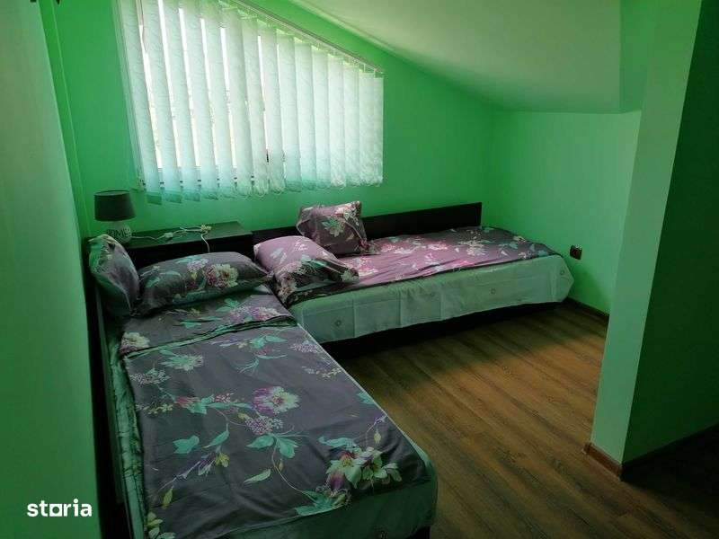 Apartament cu 3 camere in mansarda unei vile - Imagine principală: 5/8