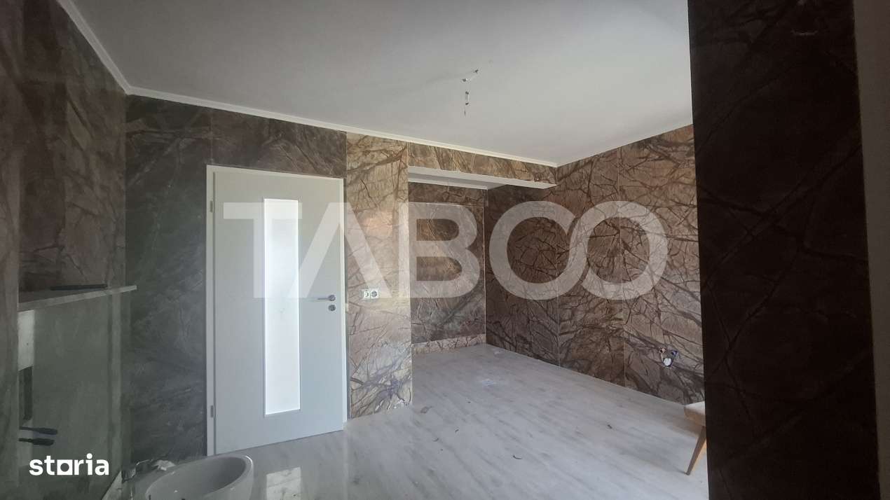 Casa de vanzare 405 mp utili 2 garaje 250 mp terase Slimnic Sibiu - Imagine principală: 4/19