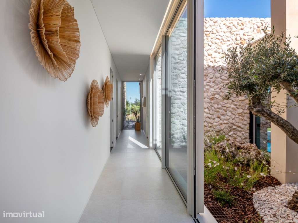 Moradia de extraordinária qualidade junto à lagoa, golfe e praia-20