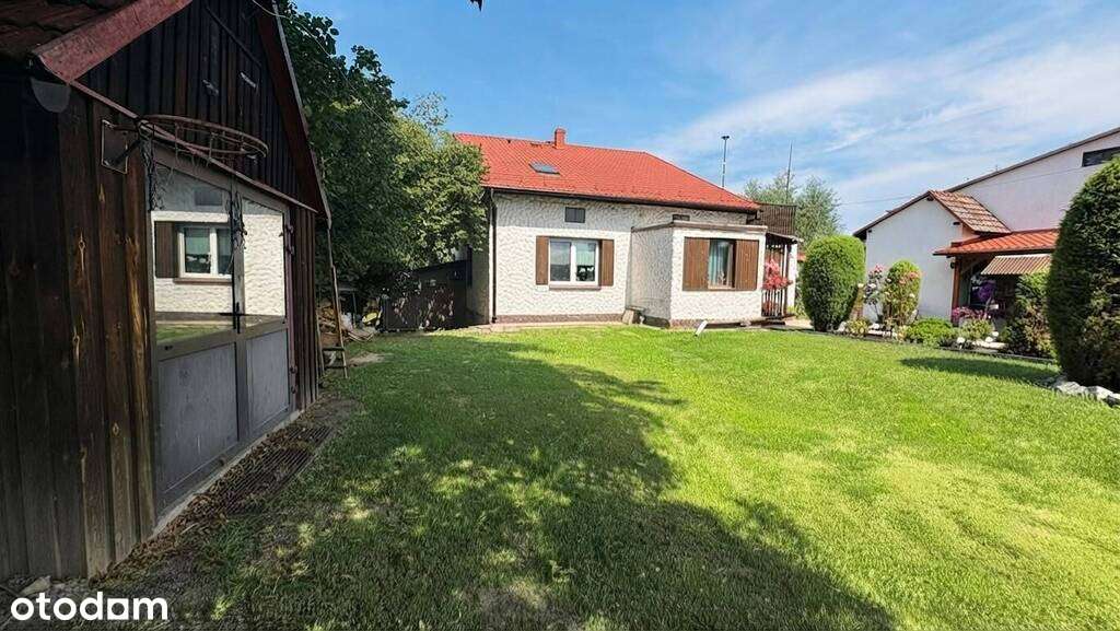 Dom z ogrodem, garażem i letnią kuchnią