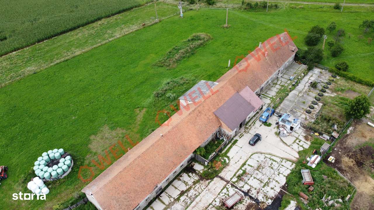 Clădire de depozitare cu locuință amenajată de vânzare în Bixad! - Imagine principală: 2/15