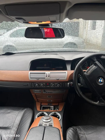 Dezmembrez BMW seria 7 E66 730Ld M57 231cp cutie calculator usa aripa capota portbagaj trager bara faruri xenon stop interior jante navigatie oglinzi plafon praguri volan etc - 16