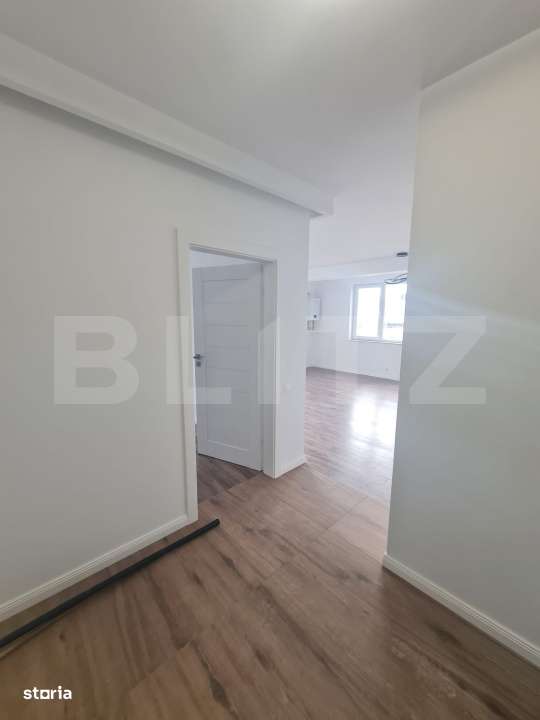 Apartament finisat, semidecomandat, 3 camere, 60 mp utili, parcare, zo - Imagine principală: 5/10