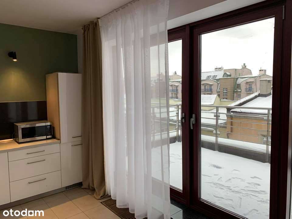 Przestronne 2-pokojowe mieszkanie z balkonem i garażem-9