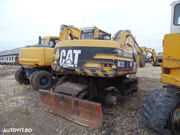 Excavator CAT 312 M,piese - 5