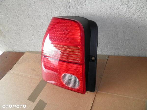 LAMPA TYLNA VW LUPO LEWA KOMPLETNA - 1