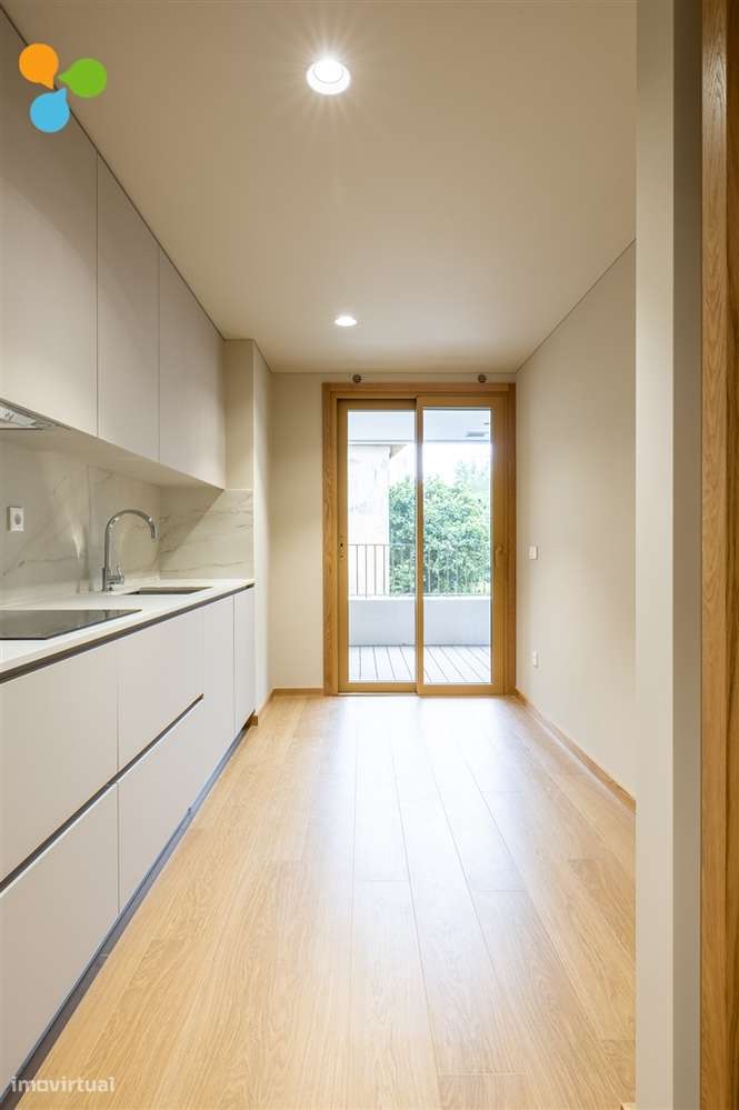 Apartamento T2 novo c/ terraço e 2 lugares de garagem-2