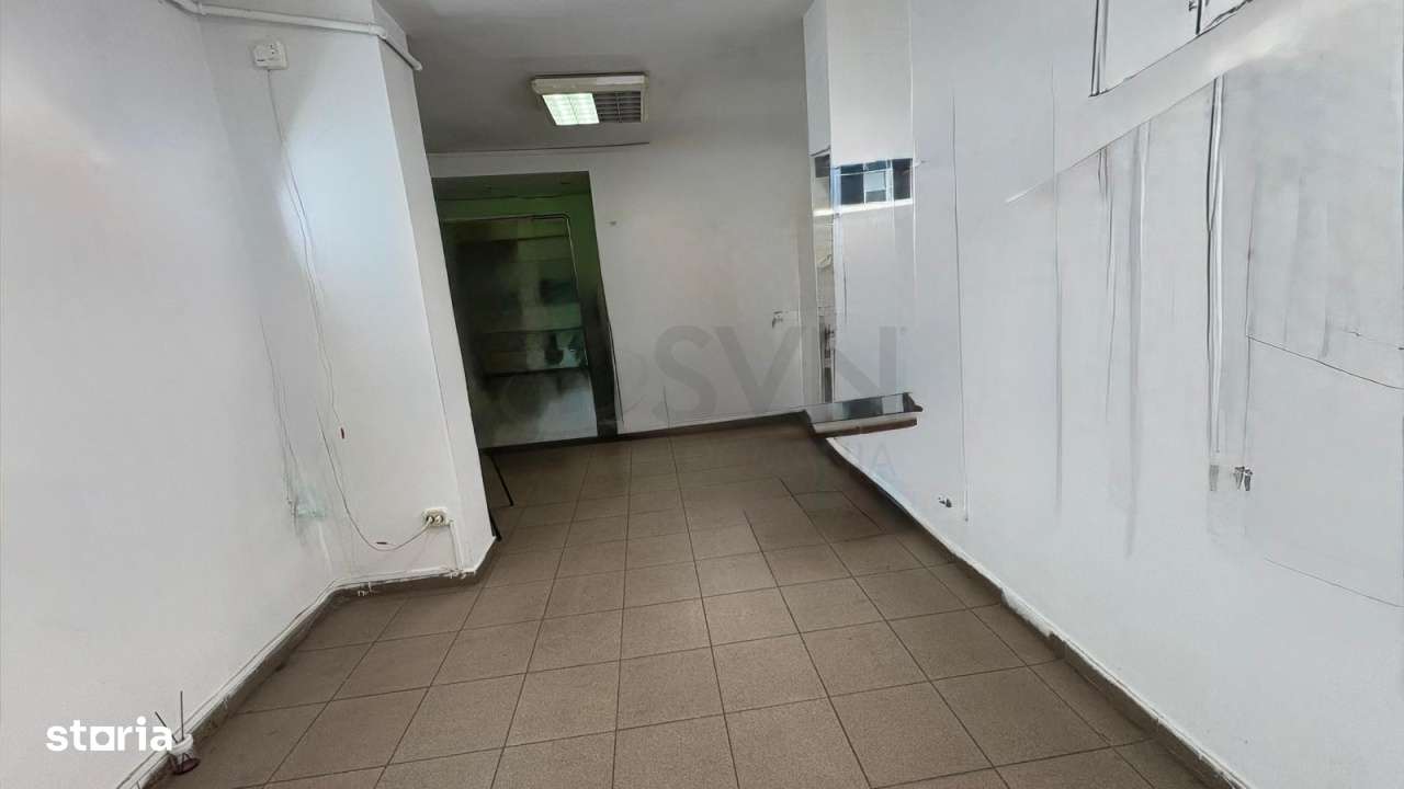 De vanzare spatiu comercial la parterul unui bloc 3 camere - Imagine principală: 4/6