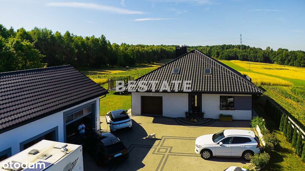 Komfortowy dom z basenem i budynkiem gospodarczym-9