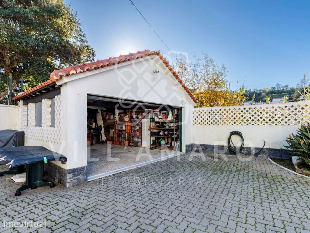 Moradia Bi-familiar térrea T2+1, com cave, renovada, jardim, garage...-52