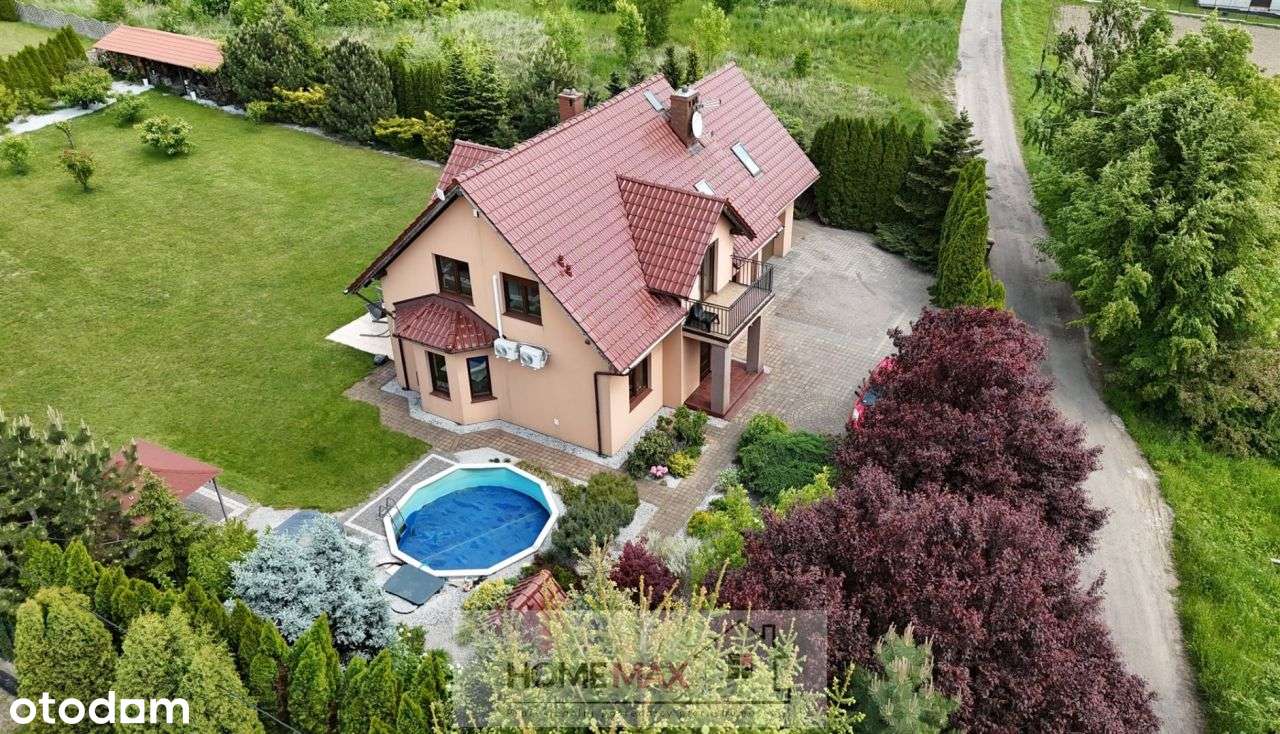 Wolnostojący dom z piękną 20 ar. działką,Grzybiany-0