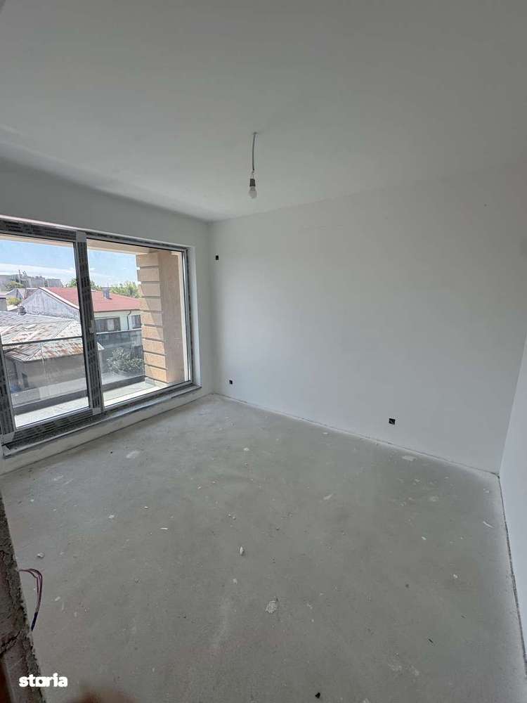 Apartament decomandat nou cu 2 camere si garaj - Imagine principală: 5/20