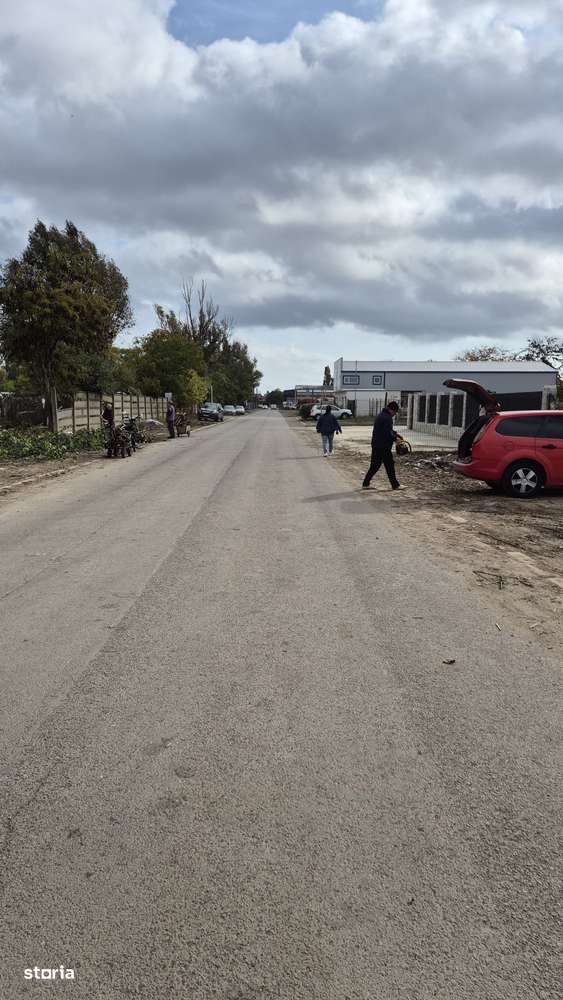 Cet zona sere teren 2000mp la str,asfaltată-6