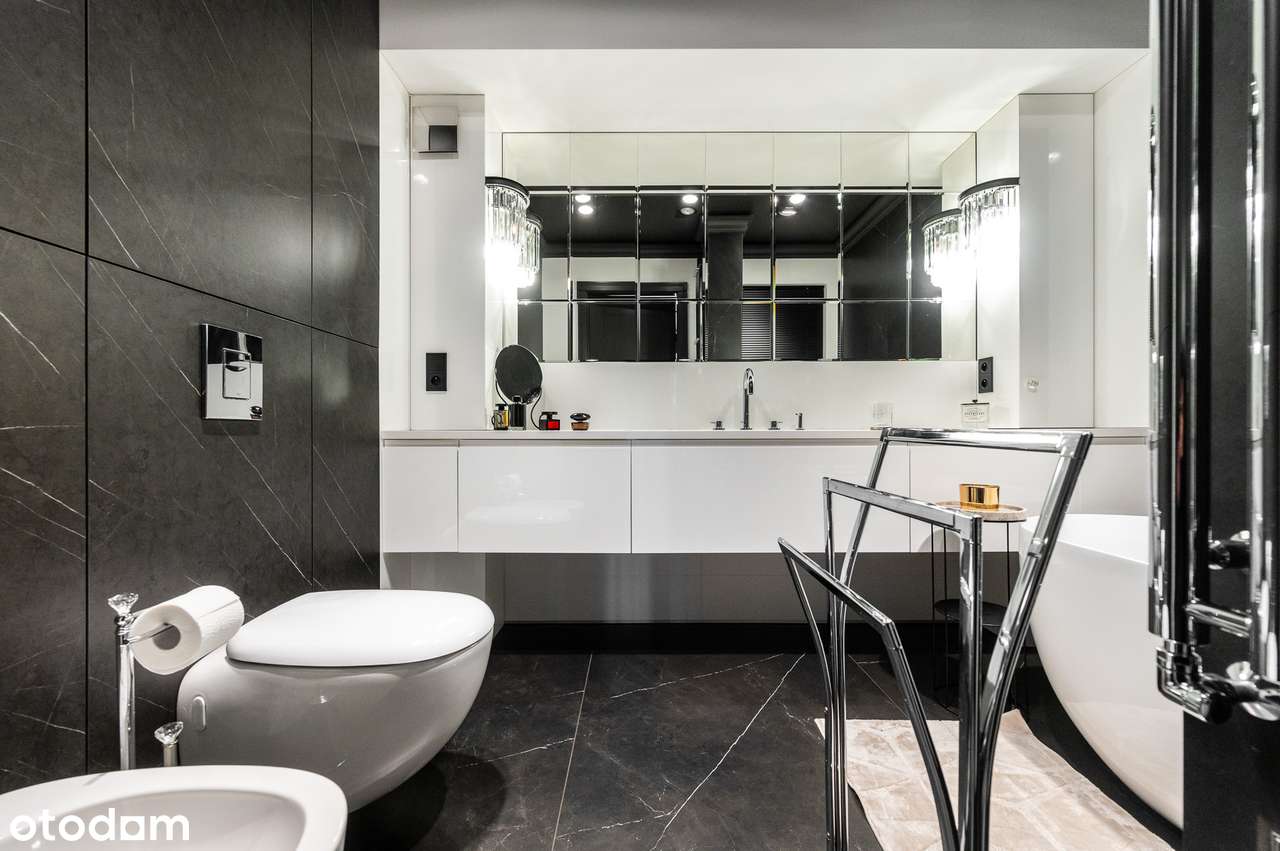 Apartament, który nie próbuje się podobać. On po prostu robi wrażenie.-19